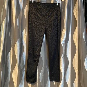 White House Black Market “The Skinny” black on black leopard print pants.